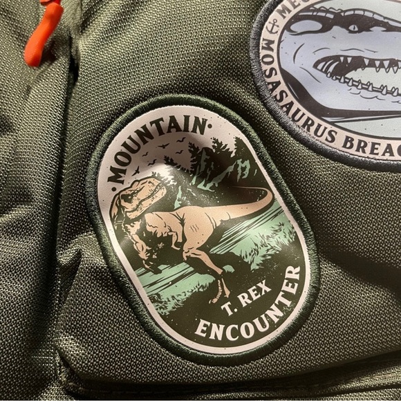 2023 BRAND NEW EDITION Universal studios GREEN Jurassic Park Backpack - Picture 2 of 16